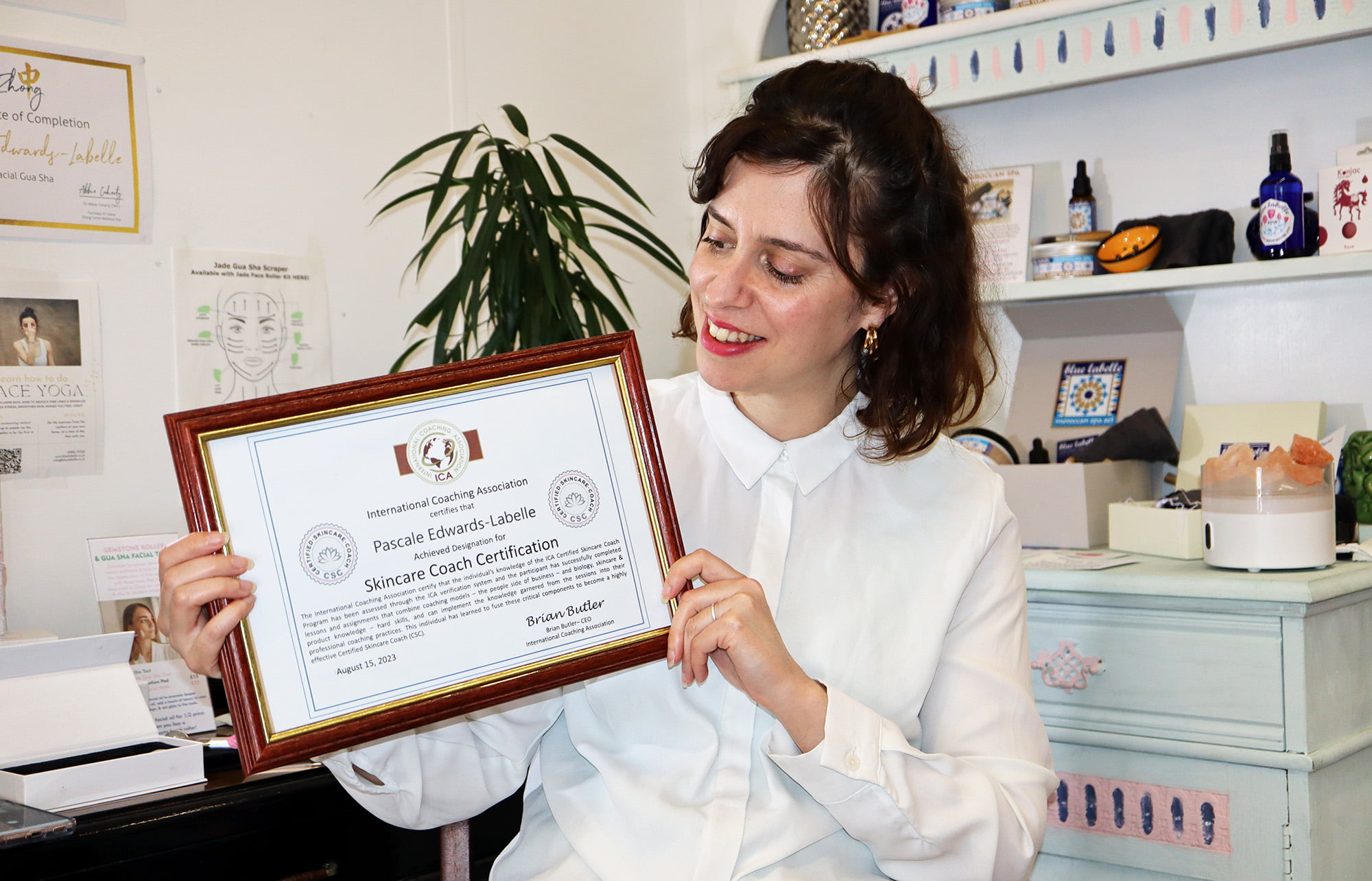 Pascale holding skincare coach certificate aug 23